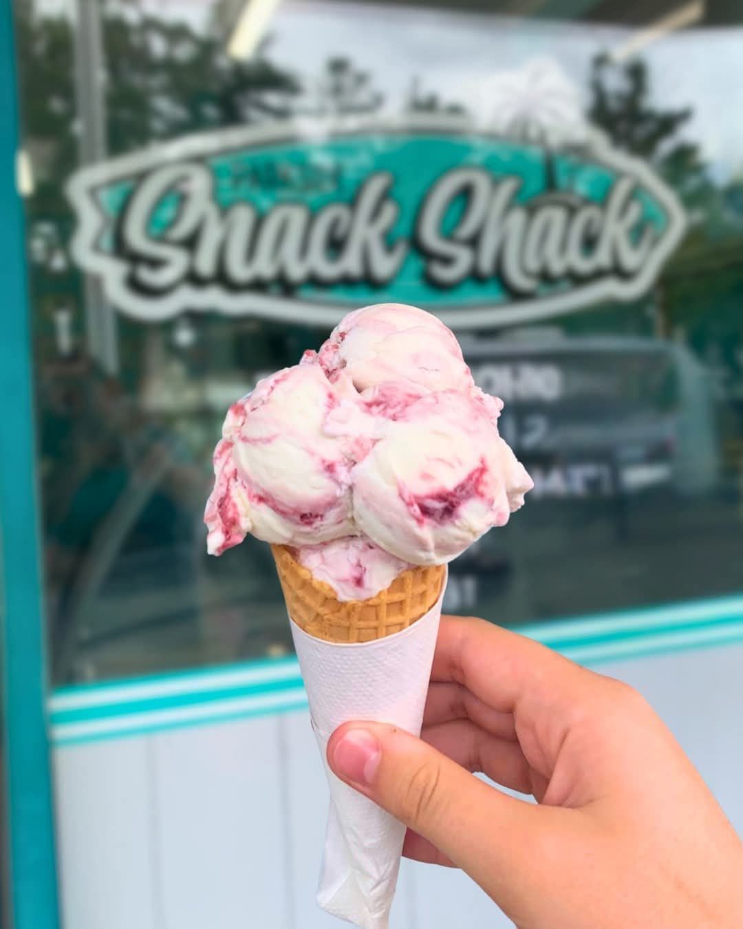 An ice cream cone outside the shop
